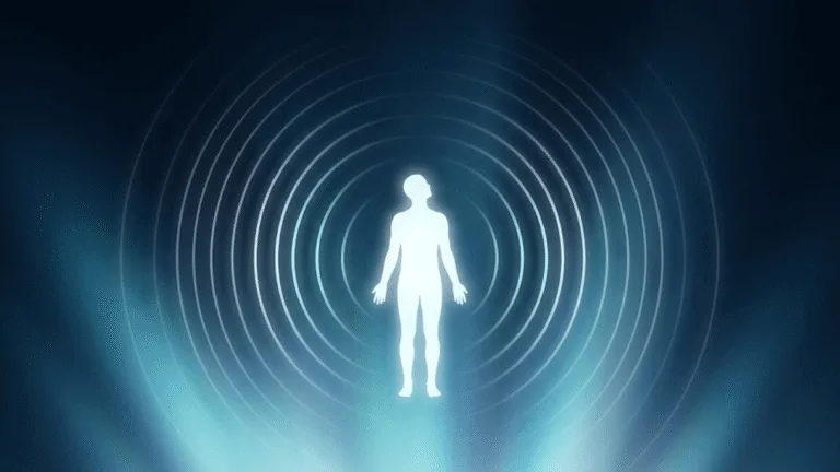 Advanced manifestation techniques visual guide — glowing human silhouette surrounded by expanding consciousness frequency rings on a dark blue background